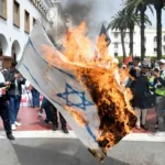 شكاية قضائية ضد نشطاء مناهضي التطبيع بسبب حرق علم إسرائيل